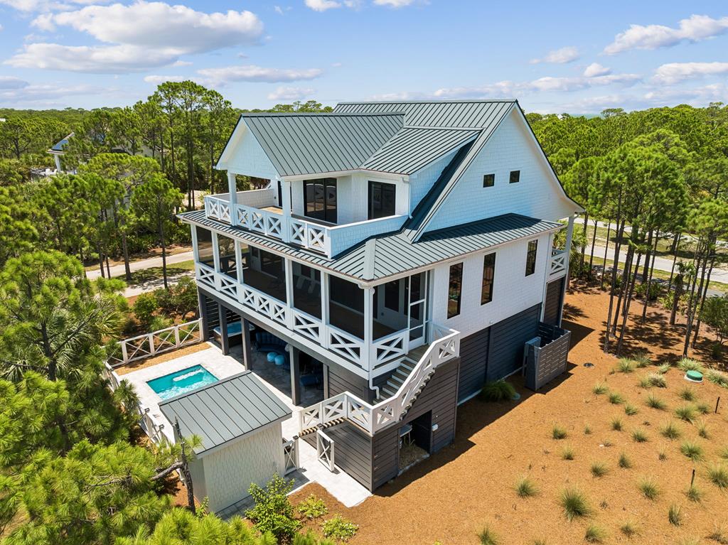 Exceptional custom beach home ready to make idyllic family memories! T – image 49
