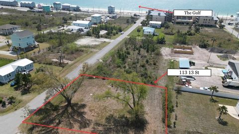 Photo of 113 13th St, Mexico Beach, FL 32456 (MLS # 327850)