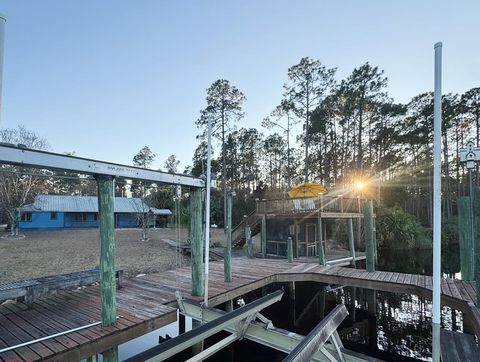 Photo of 897 Mill Rd, Carrabelle, FL 32322 (MLS # 326325)