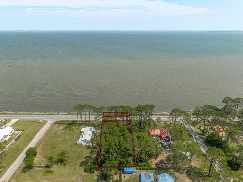 Photo of 589 Hwy 98, Eastpoint, FL 32328 (MLS # 324439)