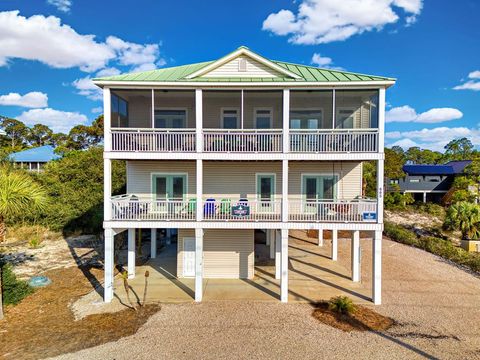 Photo of 665 E Gulf Beach Dr, Saint George Island, FL 32328 (MLS # 321622)