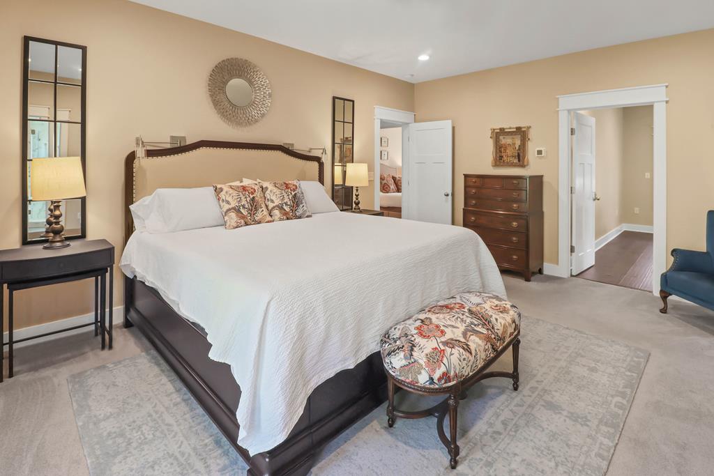 NEW and MOTIVATED seller! 2019 custom-built home on a rare one acre ho – image 24