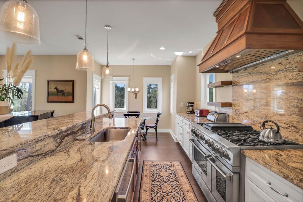 NEW and MOTIVATED seller! 2019 custom-built home on a rare one acre ho – image 15