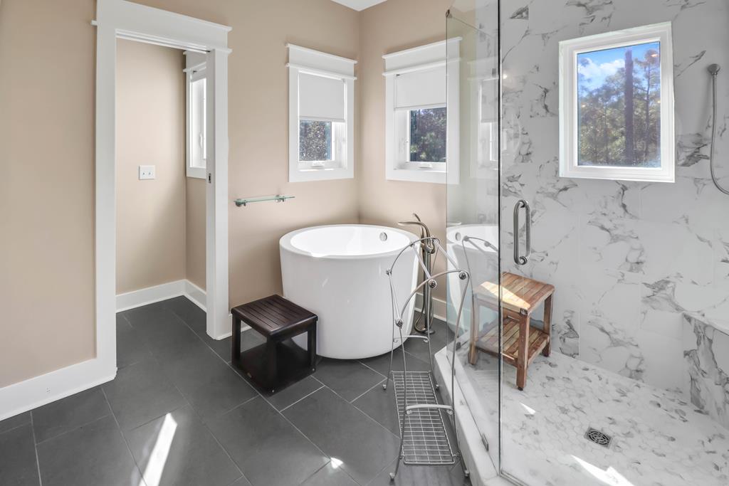 NEW and MOTIVATED seller! 2019 custom-built home on a rare one acre ho – image 26