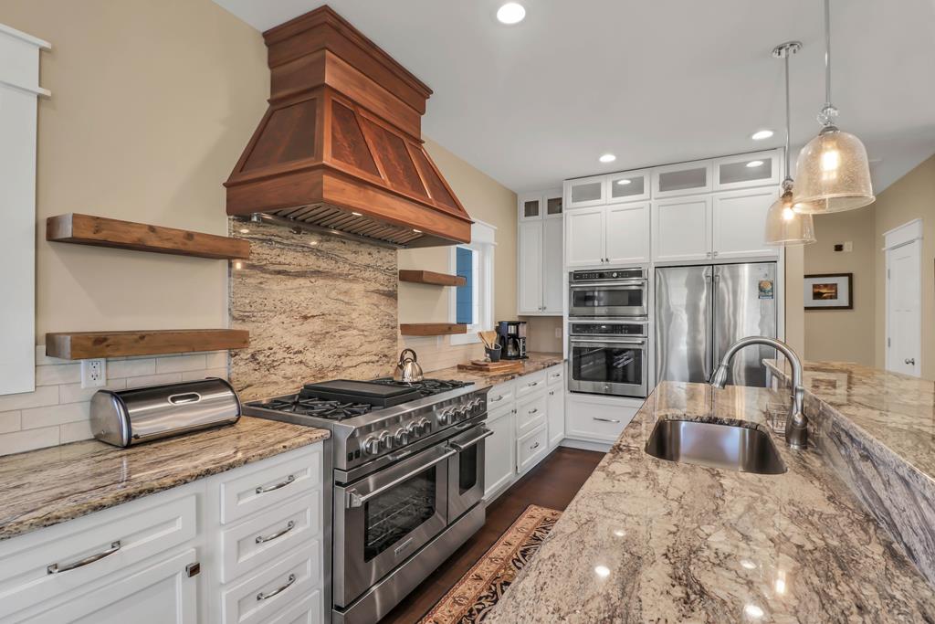 NEW and MOTIVATED seller! 2019 custom-built home on a rare one acre ho – image 14