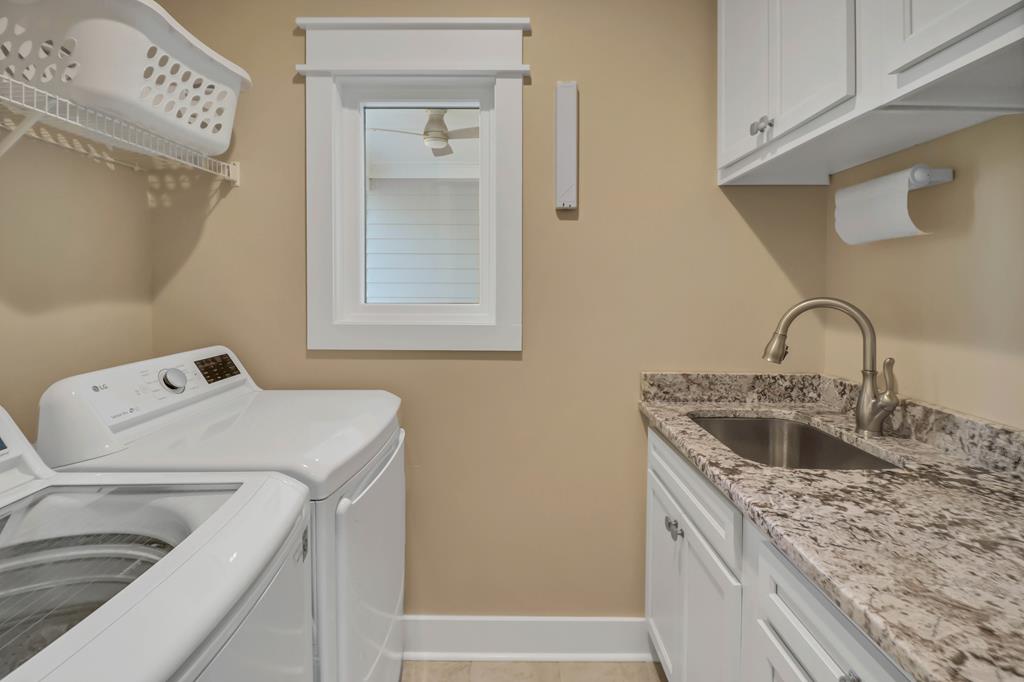 NEW and MOTIVATED seller! 2019 custom-built home on a rare one acre ho – image 42