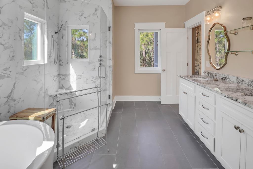 NEW and MOTIVATED seller! 2019 custom-built home on a rare one acre ho – image 25