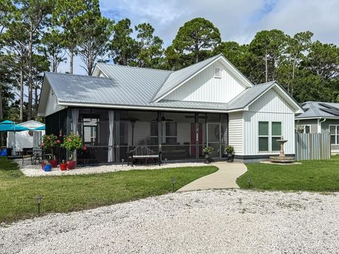 Photo of 242 15th St, Apalachicola, FL 32320 (MLS # 322683)