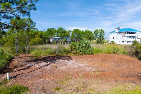 Photo of 304 Bledsoe St, Saint George Island, FL 32328 (MLS # 322686)