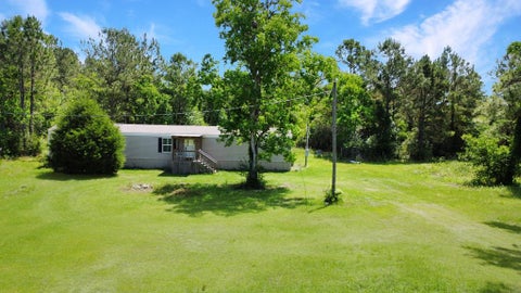Photo of 6088 Ganley Rd, Wewahitchka, FL 32465 (MLS # 328402)