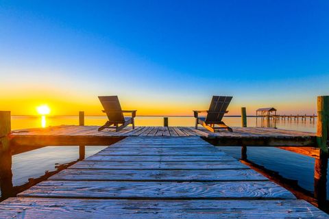 Photo of 211 N Bay Shore Dr, Eastpoint, FL 32328 (MLS # 324369)