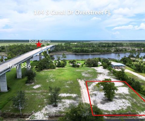 Photo of 164 S Canal Dr #1-BR, Port Saint Joe, FL 32456 (MLS # 320850)