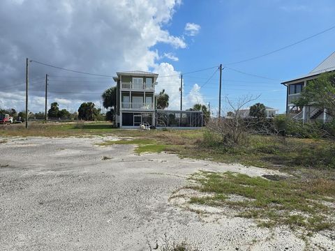 Photo of 118 16th St, Mexico Beach, FL 32456 (MLS # 327661)