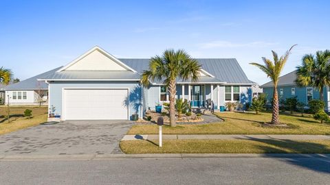 Photo of 108 St Charles St, Mexico Beach, FL 32456 (MLS # 327713)