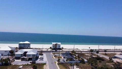 Photo of 121 15th St, Mexico Beach, FL 32456 (MLS # 326581)