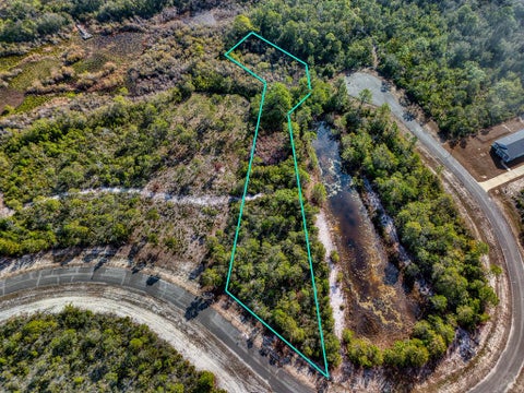 Photo of 312 Blue Heron Dr, Eastpoint, FL 32328 (MLS # 329392)