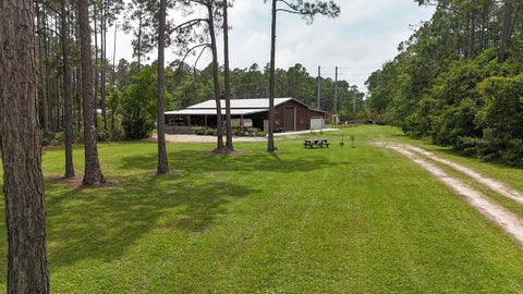 Photo of 400 Kevin Rd, Apalachicola, FL 32320 (MLS # 328551)