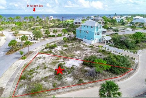 Photo of 79 Regatta Dr, Port Saint Joe, FL 32456 (MLS # 327738)