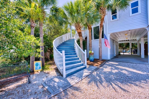 Photo of 1080 W Gulf Beach Dr, Saint George Island, FL 32328 (MLS # 328828)
