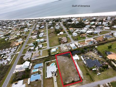 Photo of 53 1st St, Mexico Beach, FL 32456 (MLS # 322433)