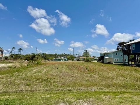Photo of 124 Pine St, Mexico Beach, FL 32456 (MLS # 321522)