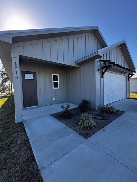 Photo of 275 Ridgecrest Pkwy, Eastpoint, FL 32328 (MLS # 327758)