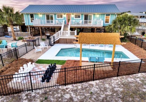 Photo of 601 E Gorrie Dr, Saint George Island, FL 32328 (MLS # 326455)