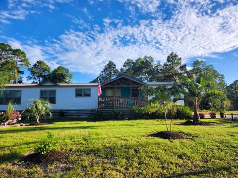 Photo of 511 NE Ave H, Carrabelle, FL 32322 (MLS # 329510)