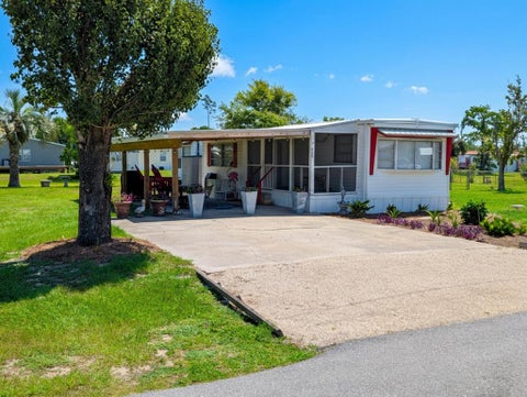 Photo of 402 Georgia Ave, Mexico Beach, FL 32456 (MLS # 328962)