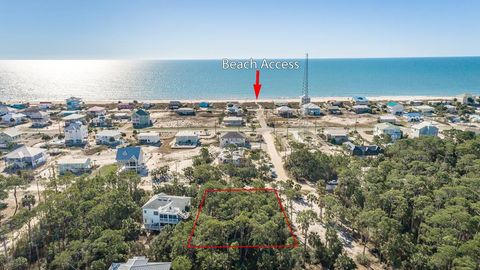 Photo of 701 E Pine Ave, Saint George Island, FL 32328 (MLS # 320529)