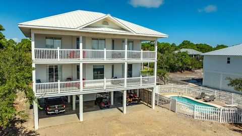Photo of 949 West Gulf Beach Dr, Saint George Island, FL 32328 (MLS # 322649)