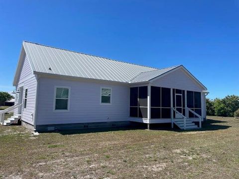 Photo of 1113 15th St, Mexico Beach, FL 32456 (MLS # 327947)