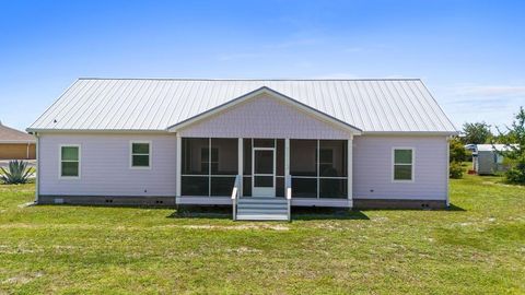 Photo of 1113 15th St, Mexico Beach, FL 32456 (MLS # 327947)