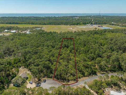 Photo of 130 Cedar St, Eastpoint, FL 32328 (MLS # 328147)