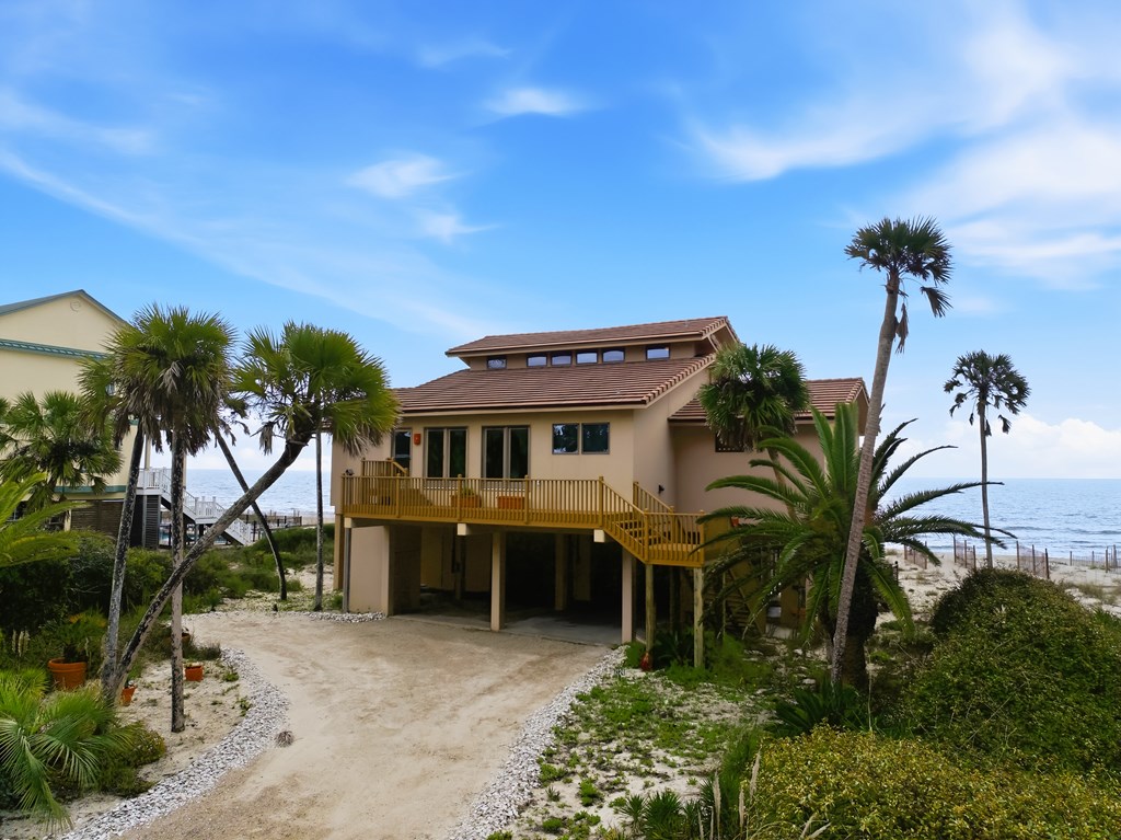 Located within a highly desirable gated coastal community, this never- – image 10