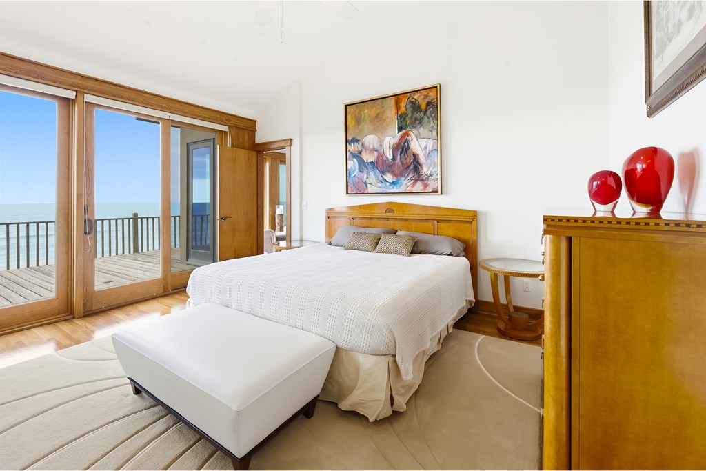 Located within a highly desirable gated coastal community, this never- – image 30