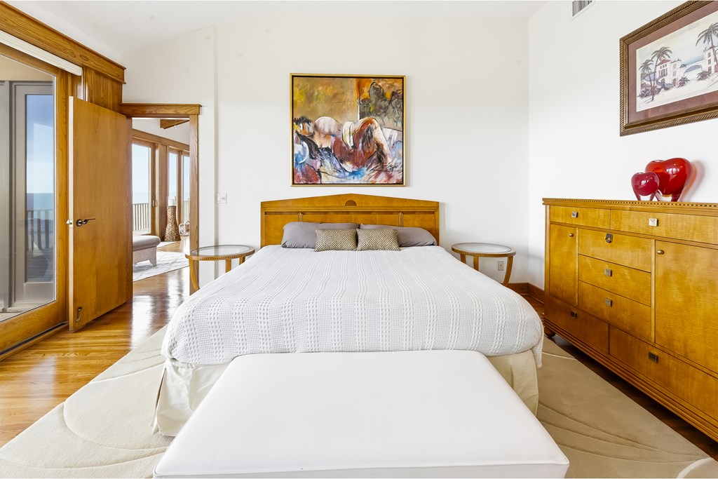 Located within a highly desirable gated coastal community, this never- – image 32