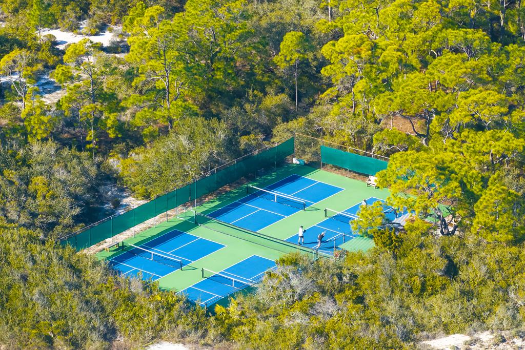 Located within a highly desirable gated coastal community, this never- – image 62