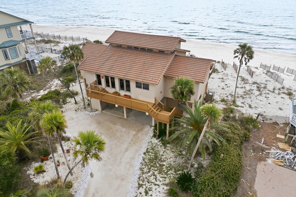 Located within a highly desirable gated coastal community, this never- – image 3