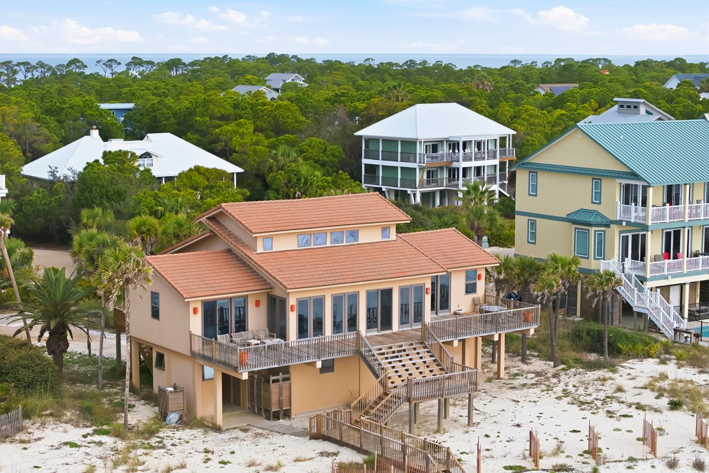 Located within a highly desirable gated coastal community, this never- – image 7