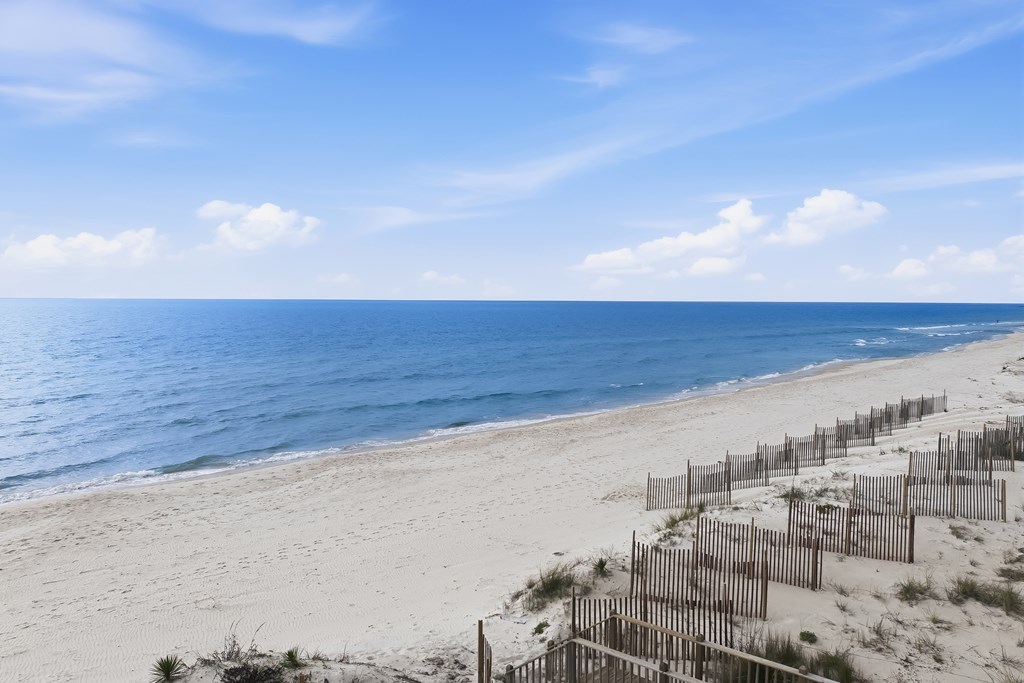 Located within a highly desirable gated coastal community, this never- – image 47