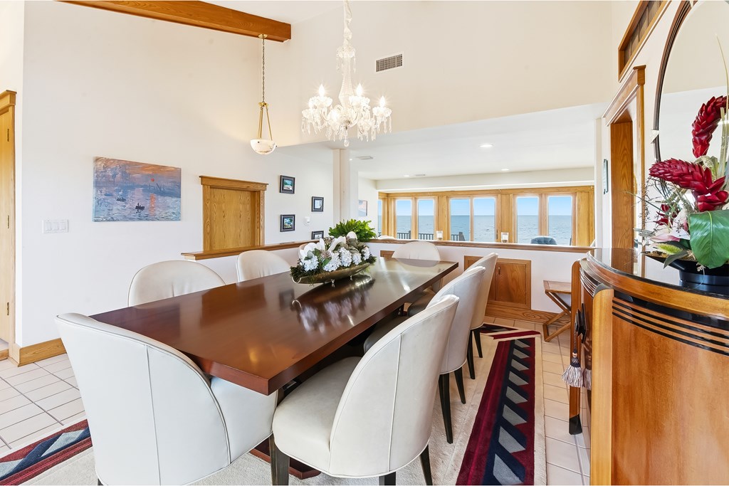 Located within a highly desirable gated coastal community, this never- – image 25