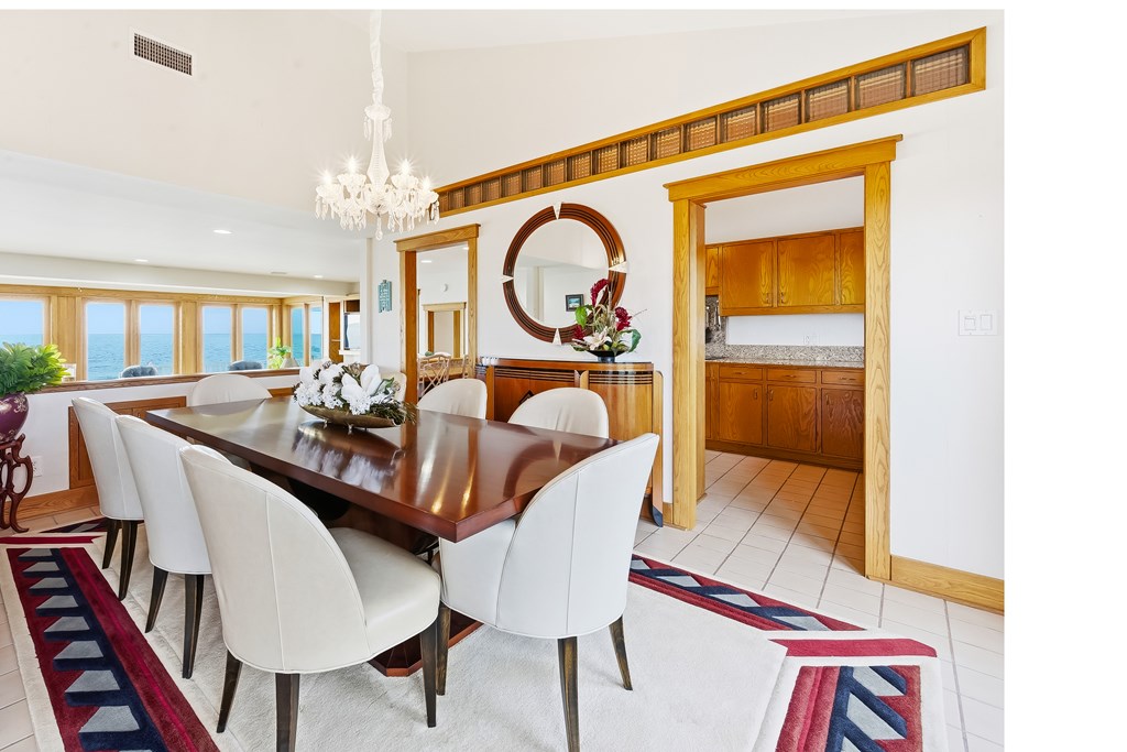Located within a highly desirable gated coastal community, this never- – image 24