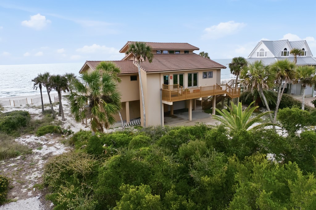 Located within a highly desirable gated coastal community, this never- – image 9