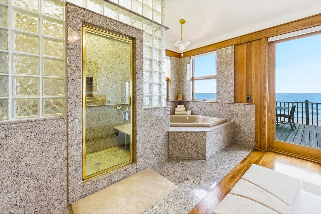 Located within a highly desirable gated coastal community, this never- – image 34