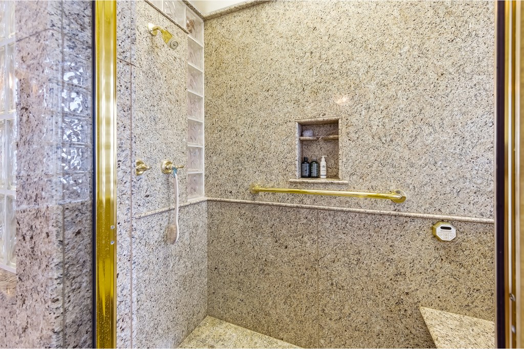 Located within a highly desirable gated coastal community, this never- – image 35