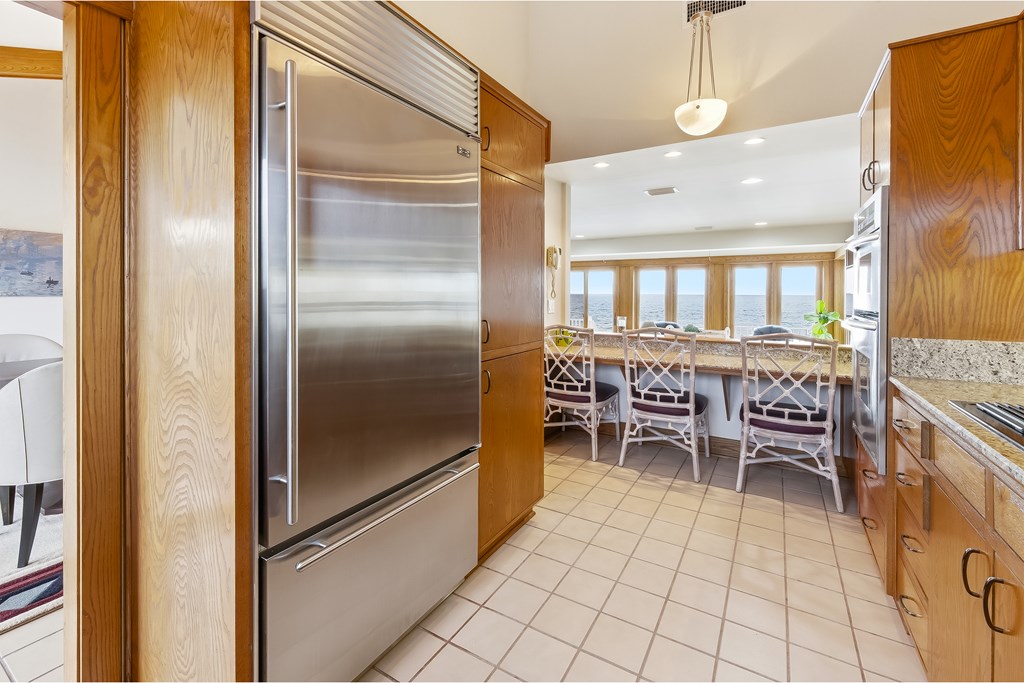 Located within a highly desirable gated coastal community, this never- – image 22