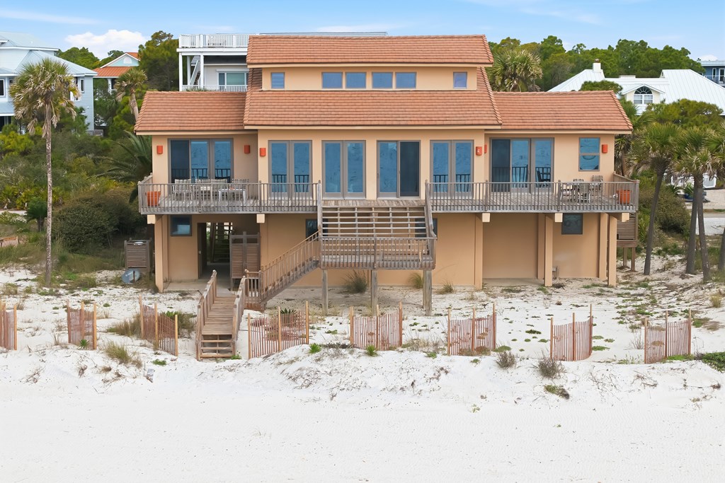 Located within a highly desirable gated coastal community, this never- – image 8