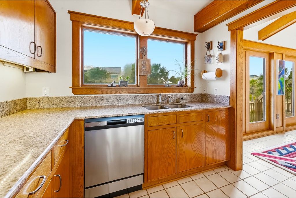 Located within a highly desirable gated coastal community, this never- – image 23