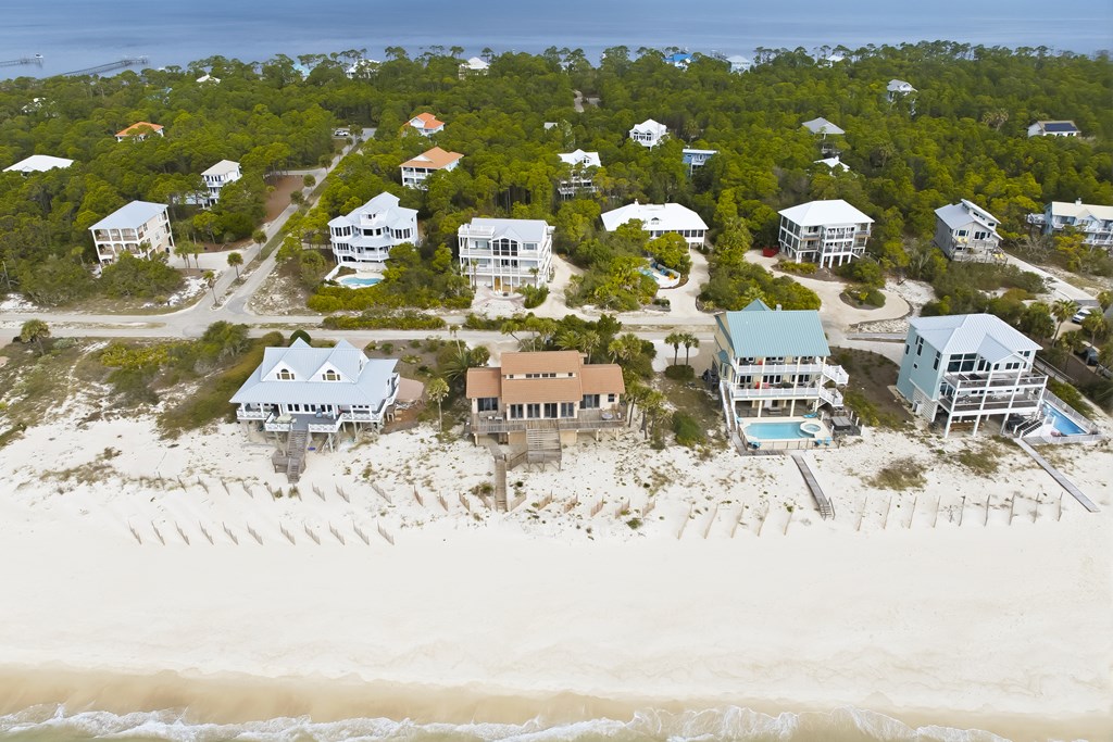 Located within a highly desirable gated coastal community, this never- – image 53